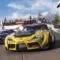 Arte oficial de Forza Horizon 6 com três carros de corrida disputando largada no Horizon Festival com Monte Fuji ao fundo